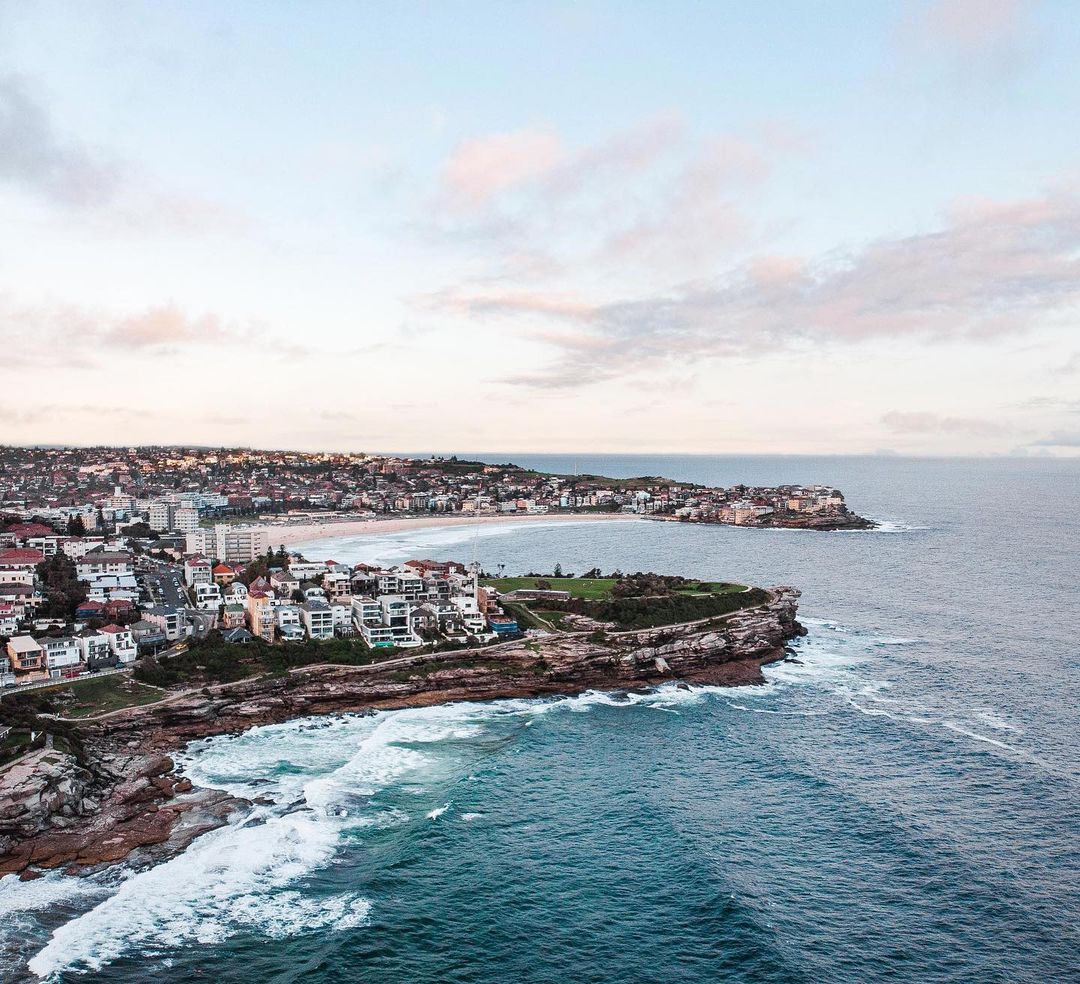 Ariel view over Bondi Beach as the sunrises. Image by Daniel Jacobs.